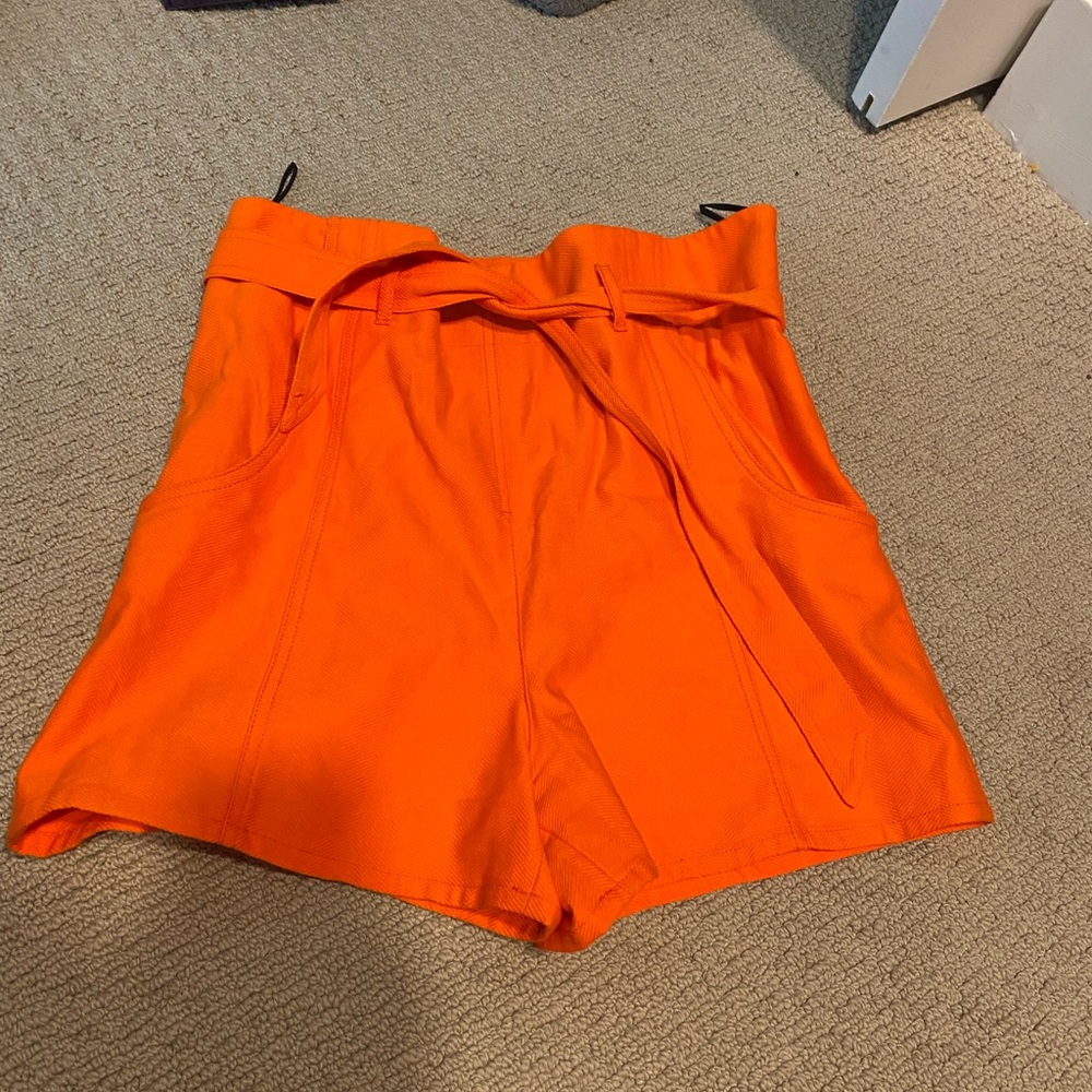 TELA orange high waisted tie shorts